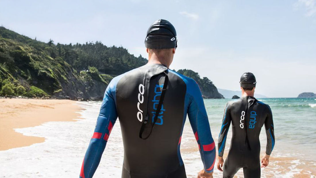 2 openwater swimmers on the beach - five open water swimming essentials