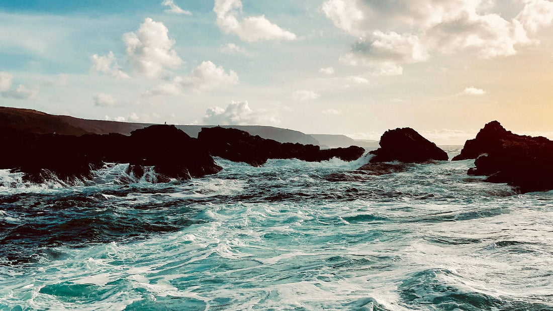 waves crashing on rocks