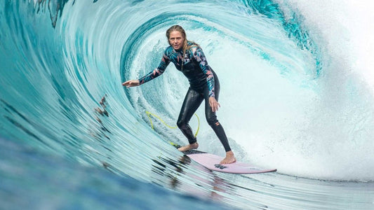 woman surfing a big wave