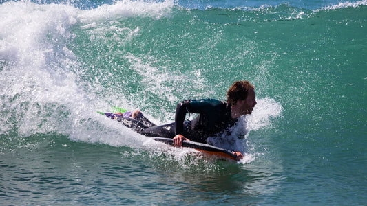 bodyboarder surfing a wave
