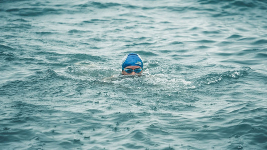 A man swimming in the ocean