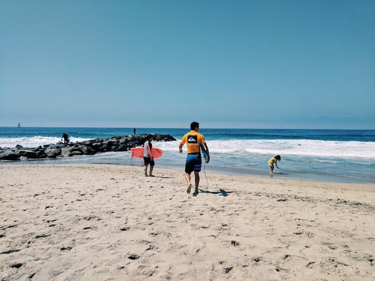 A man wearing a quicksilver rash vest