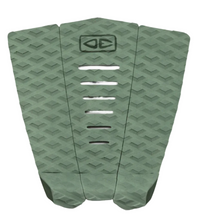 Sage surfboard tail pad with geometric pattern on a white background.