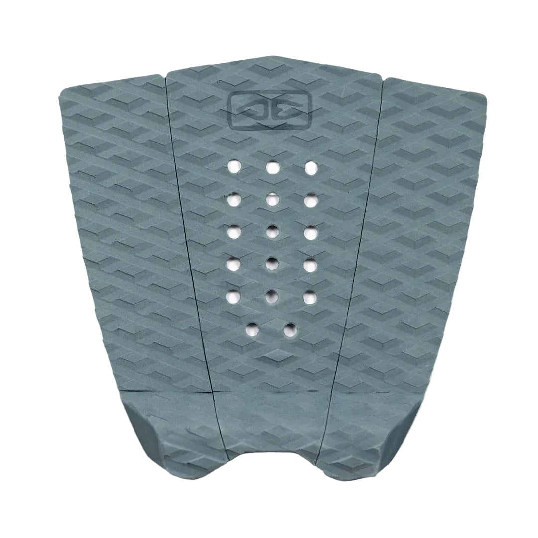 Blue surfboard fish tail pad with geometric pattern on a white background