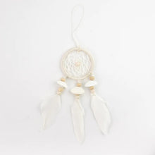 Made with cotton, bamboo, assorted beads, shells and feathers.