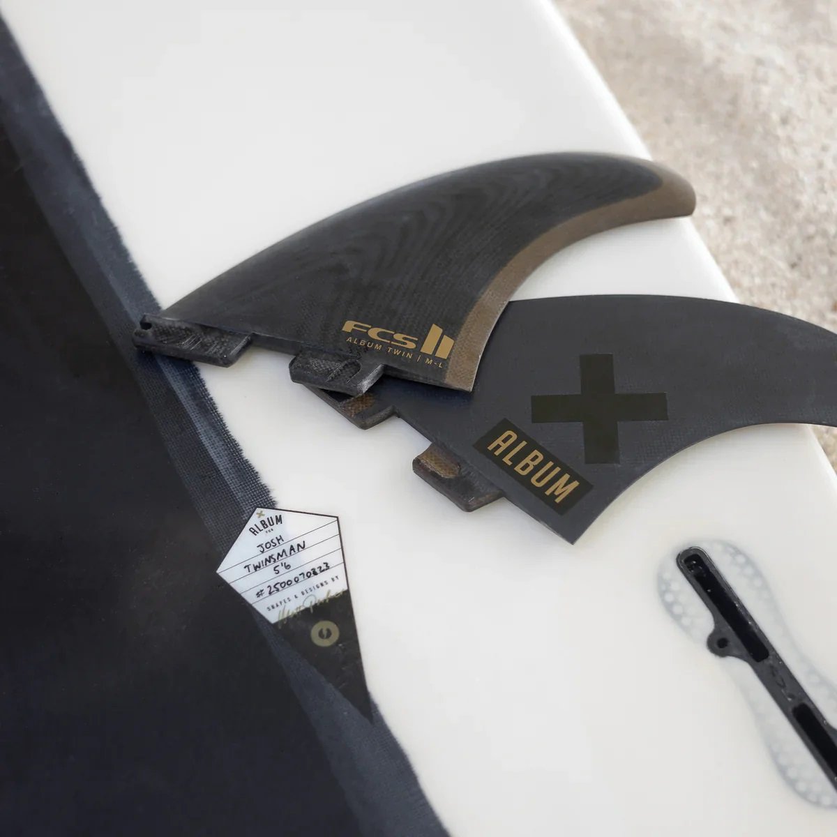 FCS II Album PG Twin +1 Fins - Black/Gold